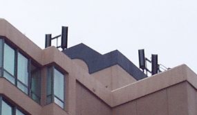 Forest green cells on building at Hemlock and Broadway, Vancouver